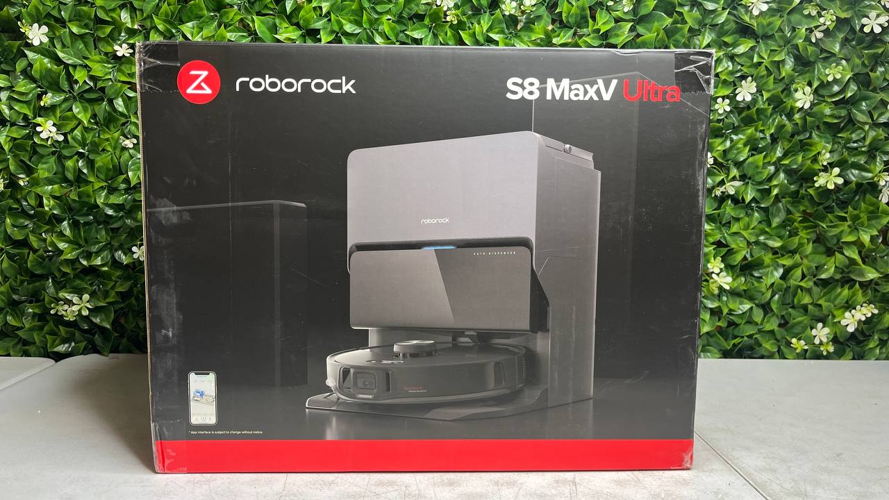 robot vacuum cleaner cleaning living room floor